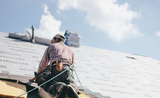 roofing crew with a roofer
