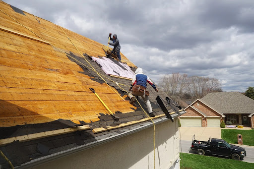 Storm-damaged roof requiring emergency roofing services in Ambler PA