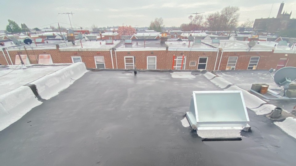 Torch-Down Roofs on Philadelphia Rowhomes: Lifespan, Repairs and When to Replace